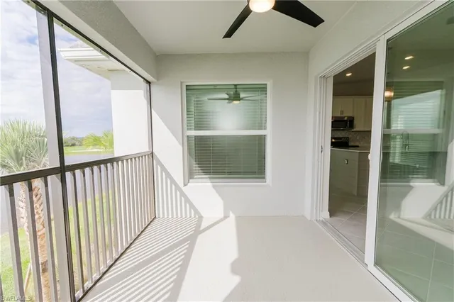 a view of a hallway with a window