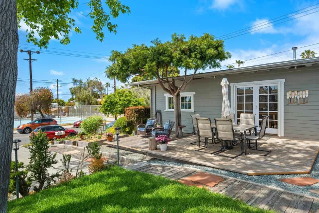 a view of a swimming pool with a patio