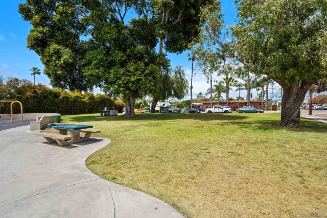 a view of outdoor space with garden and trees