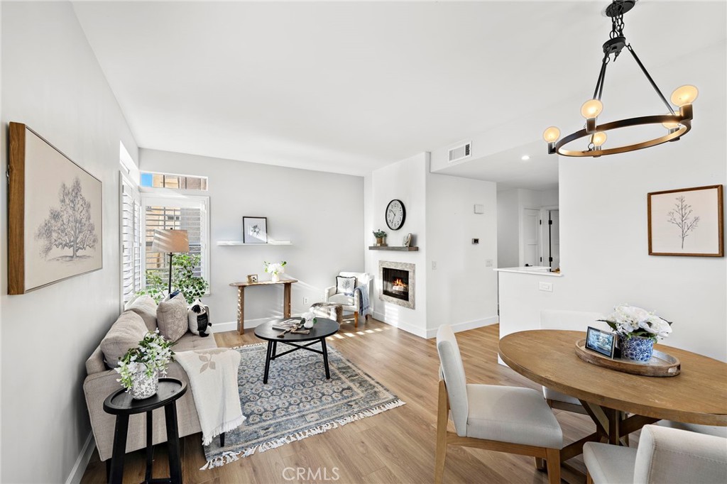 9 Violado Rancho Santa Margarita, CA 92688 - Photo 12 of 41 a living room with furniture and wooden floor