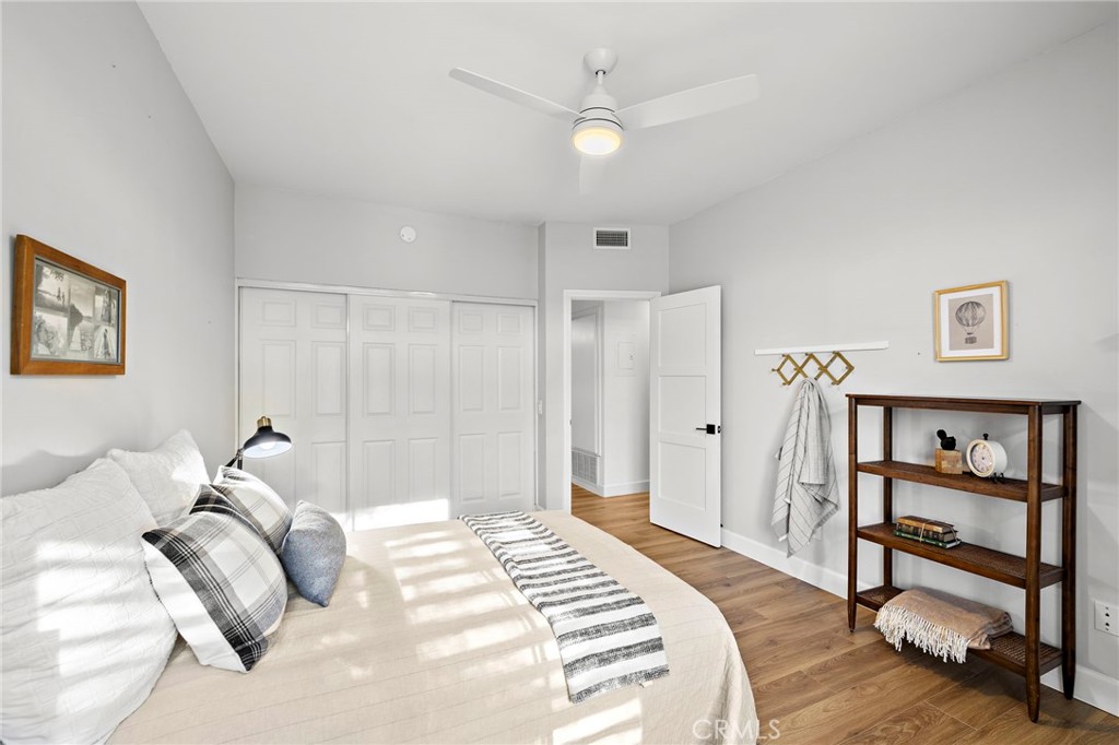 9 Violado Rancho Santa Margarita, CA 92688 - Photo 24 of 41 a bedroom with a bed and a painting on the wall