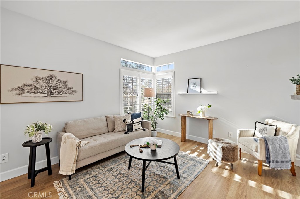 9 Violado Rancho Santa Margarita, CA 92688 - Photo 9 of 41 a living room with furniture a rug and a table