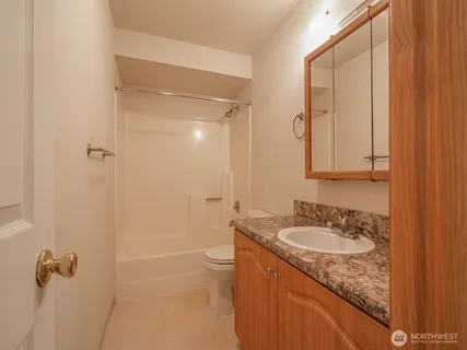 a view of a bathroom with washing machine