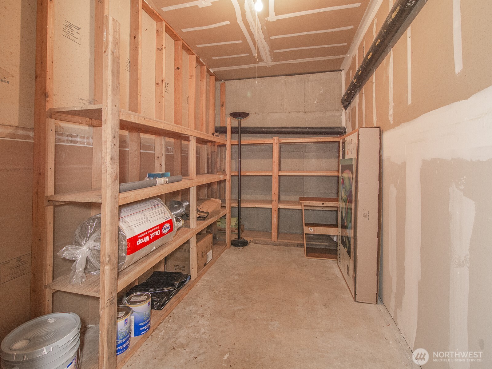 14527 Northeast 40th Street, Unit G204 Bellevue, WA 98007 - Photo 15 of 17 a view of walk in closet with clothes and shoes