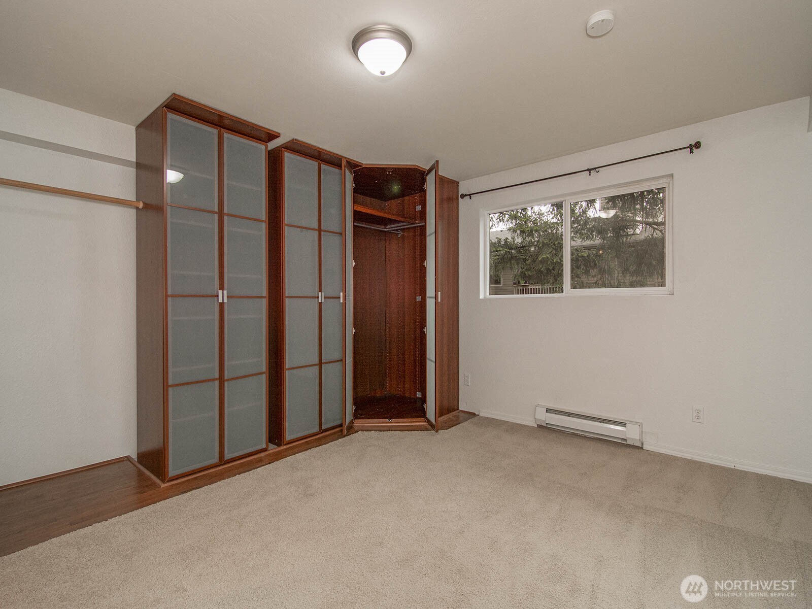 14527 Northeast 40th Street, Unit G204 Bellevue, WA 98007 - Photo 10 of 17 an empty room with windows