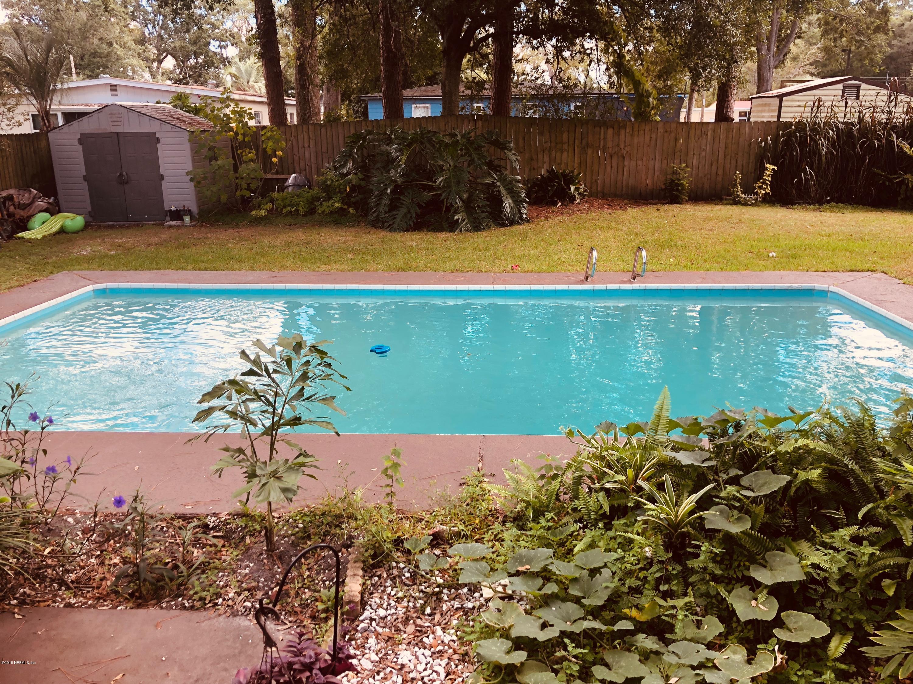 5461 Cardan Road Jacksonville, FL 32244 - Photo 1 of 8 a view of a pool with a yard