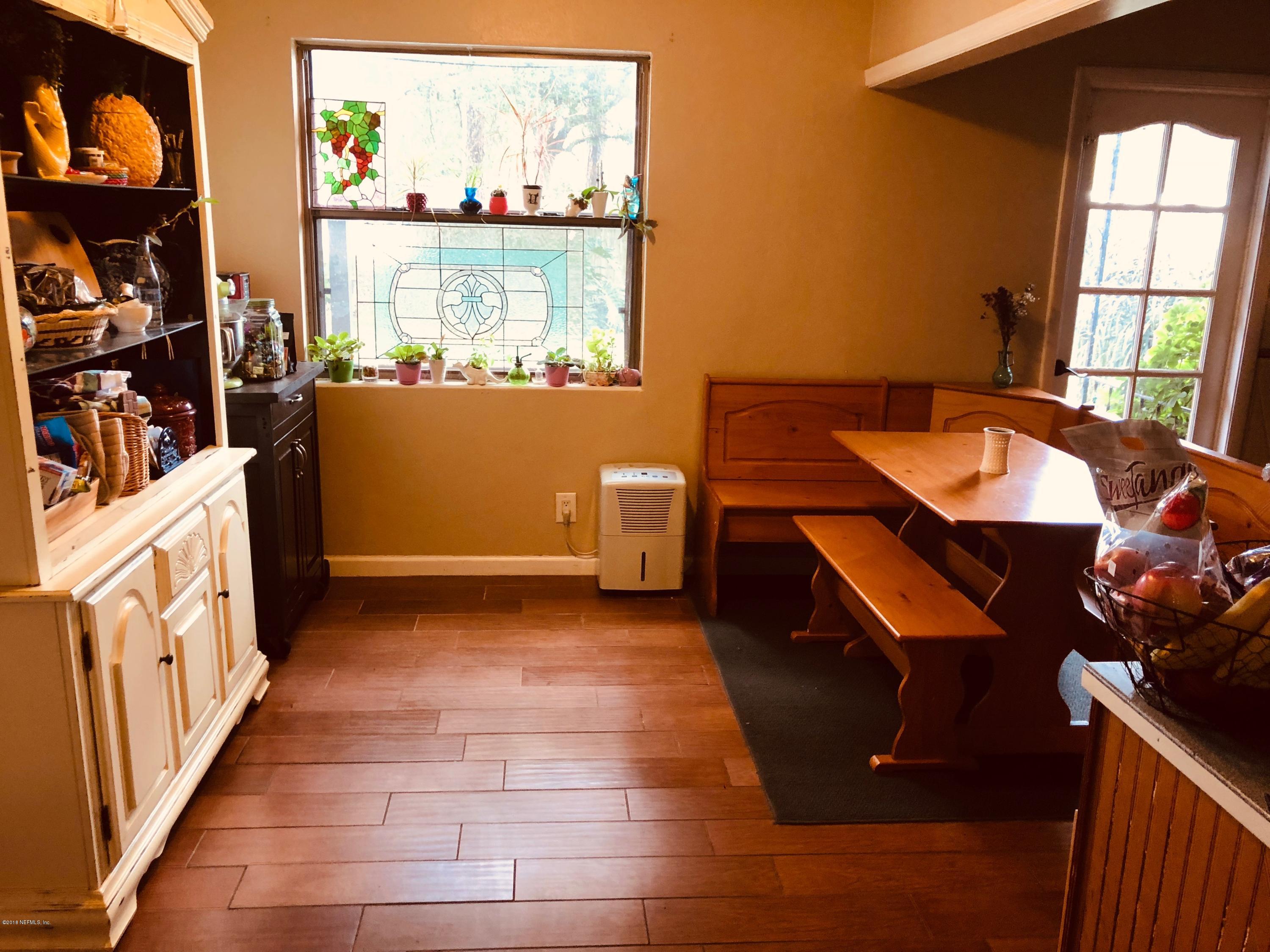 5461 Cardan Road Jacksonville, FL 32244 - Photo 4 of 8 a room with furniture and a window