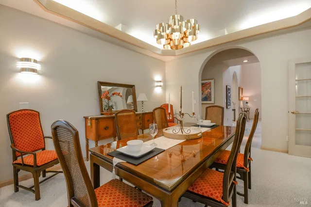 a bathroom with a sink a mirror and a shower