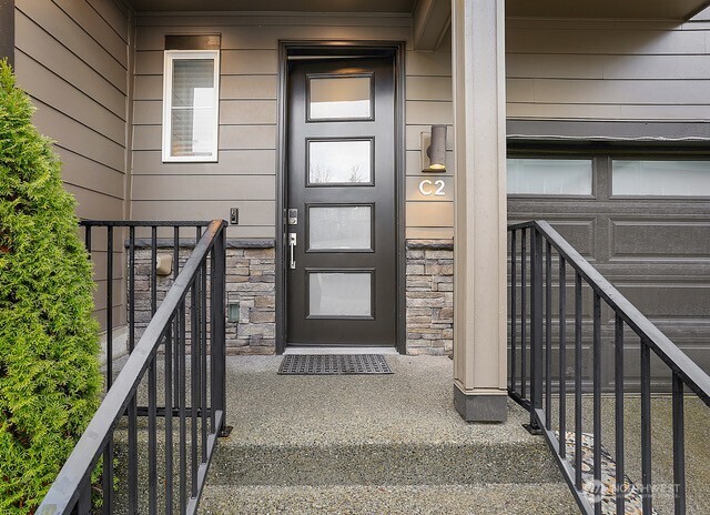 1325 Seattle Hill Road, Unit C2 Bothell, WA 98012 - Photo 1 of 26 a view of front door of house and stairs