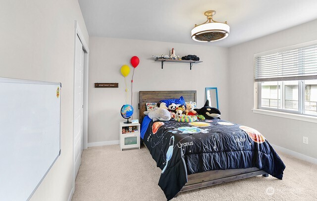 1325 Seattle Hill Road, Unit C2 Bothell, WA 98012 - Photo 15 of 26 a bed room with a bed and a window