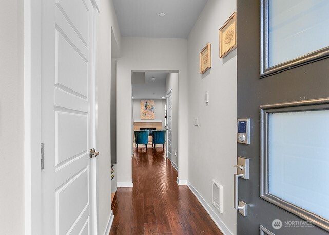 1325 Seattle Hill Road, Unit C2 Bothell, WA 98012 - Photo 2 of 26 a view of a hallway with wooden floor and staircase