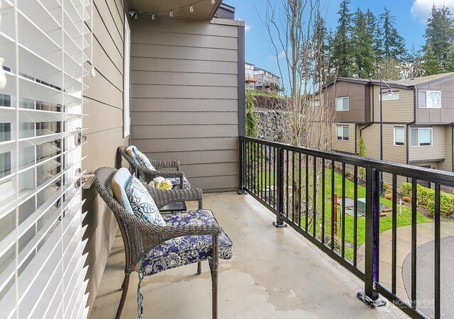 1325 Seattle Hill Road, Unit C2 Bothell, WA 98012 - Photo 24 of 26 a view of balcony with couple of chairs