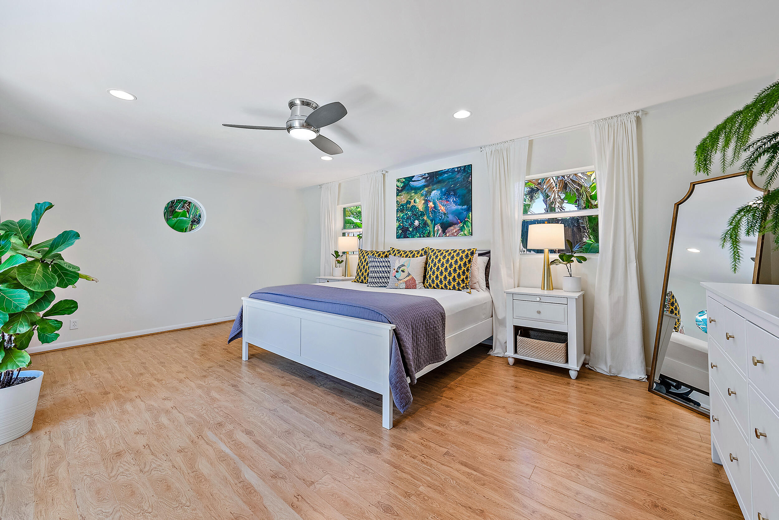 246 Gregory Road West Palm Beach, FL 33405 - Photo 12 of 20 a bedroom with a bed dresser and a window