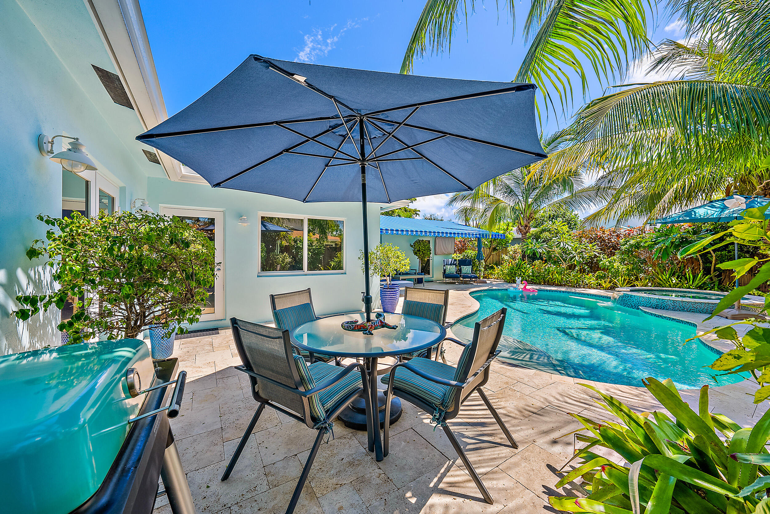246 Gregory Road West Palm Beach, FL 33405 - Photo 17 of 20 a view of an outdoor sitting area with furniture
