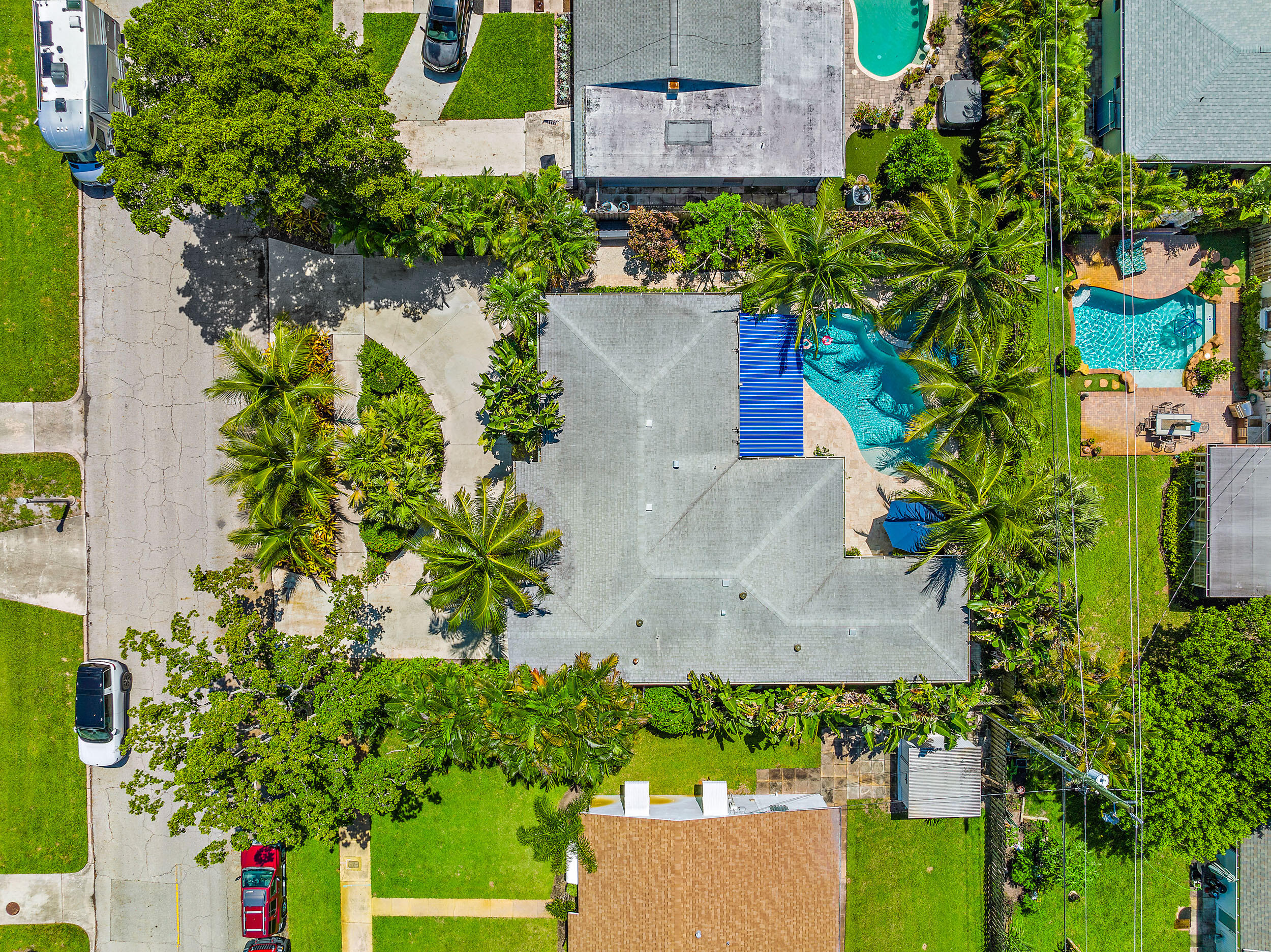 246 Gregory Road West Palm Beach, FL 33405 - Photo 18 of 20 an aerial view of a house with a yard and garden in back
