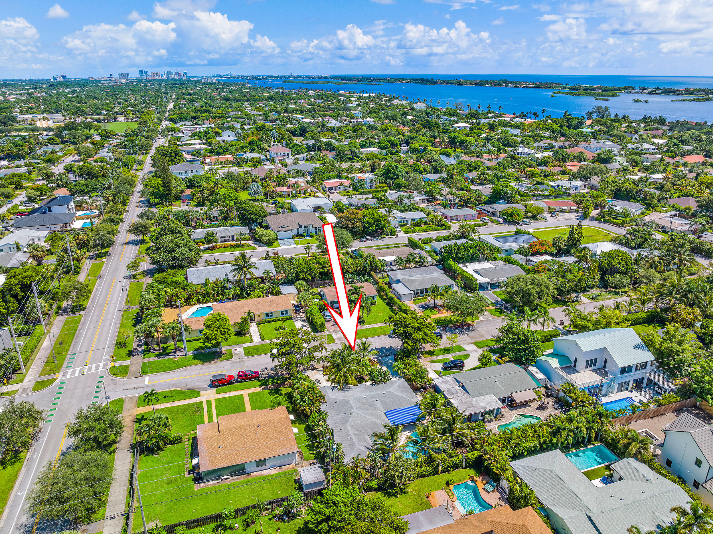 246 Gregory Road West Palm Beach, FL 33405 - Photo 19 of 20 an aerial view of residential houses with outdoor space and trees