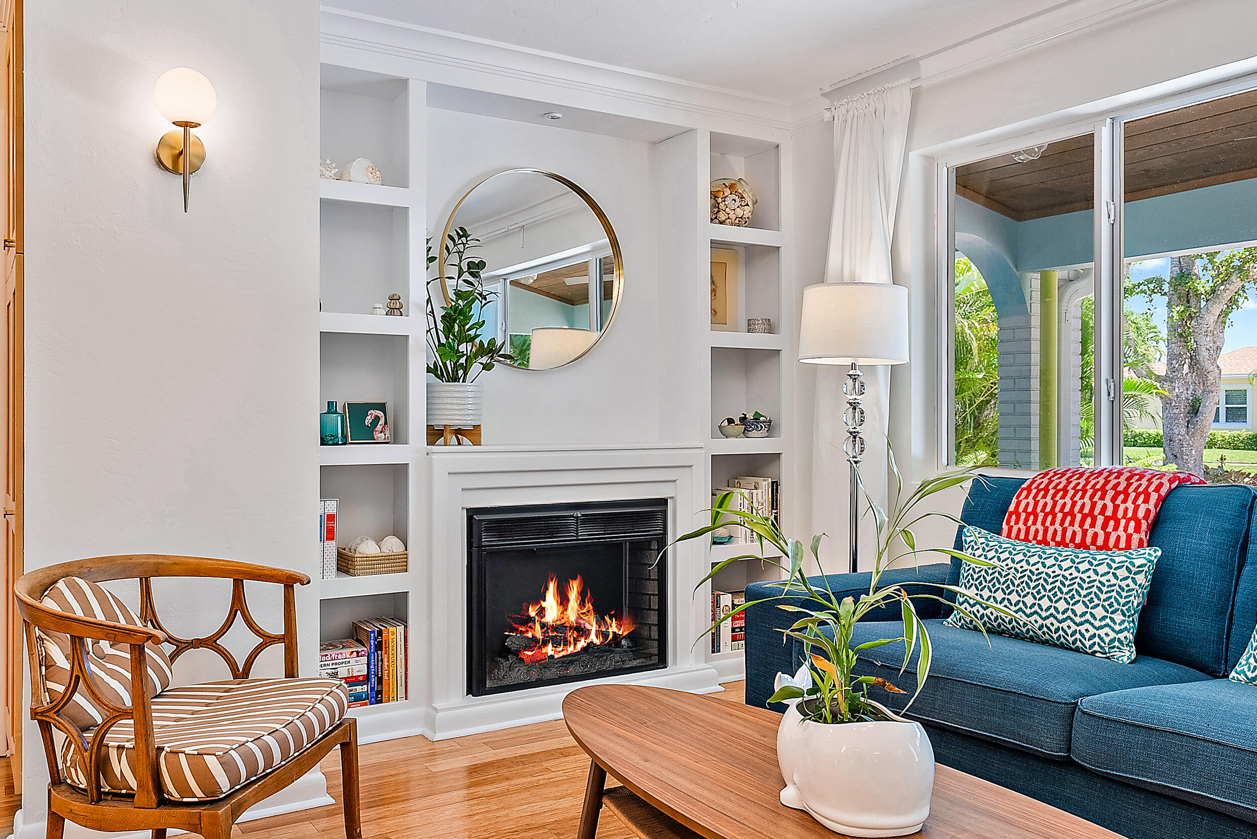 246 Gregory Road West Palm Beach, FL 33405 - Photo 6 of 20 a living room with furniture and a fireplace