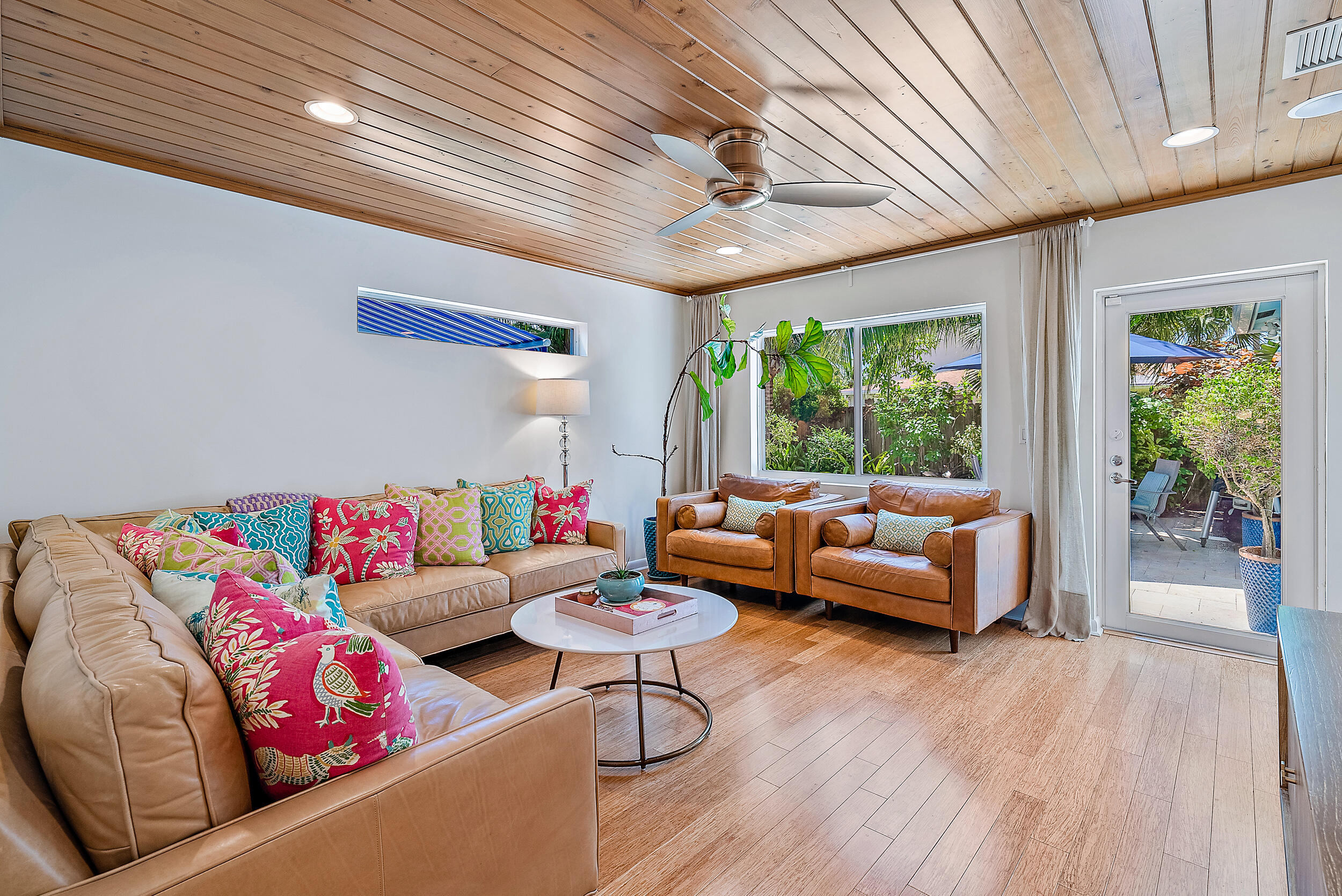 246 Gregory Road West Palm Beach, FL 33405 - Photo 9 of 20 a living room with furniture and a large window