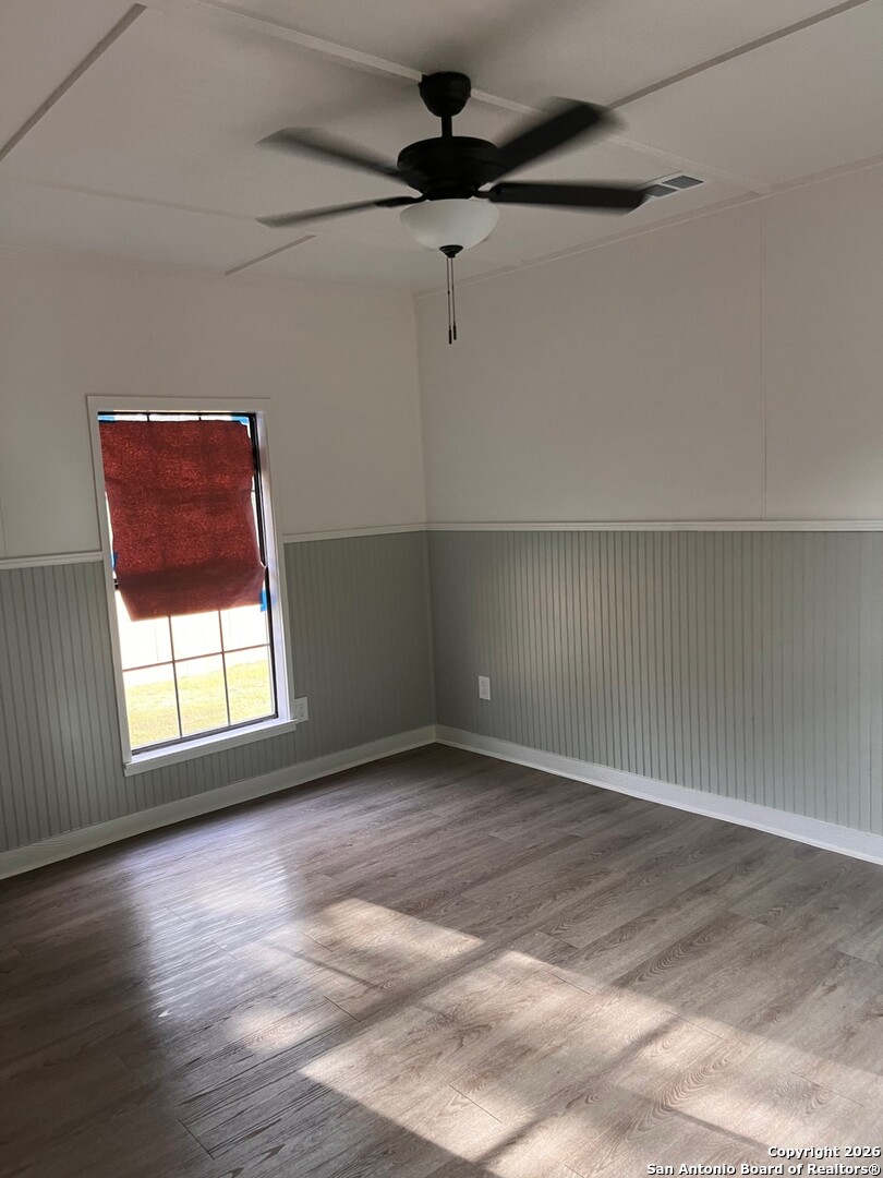 1510 12th Street Hondo, TX 78861 - Photo 13 of 14 an empty room with windows