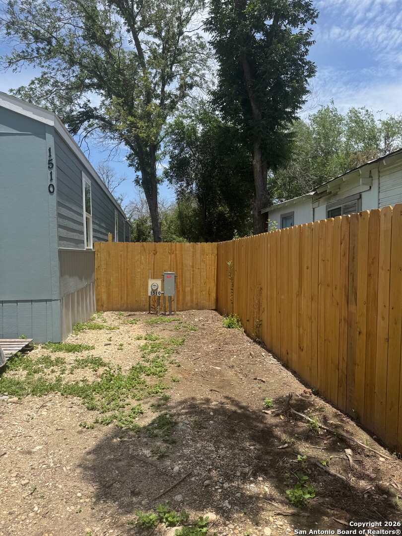 1510 12th Street Hondo, TX 78861 - Photo 2 of 14 a backyard of a house
