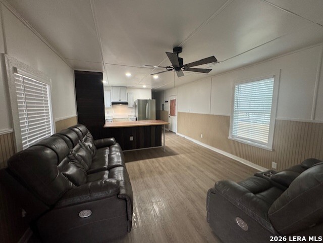 1510 12th Street Hondo, TX 78861 - Photo 5 of 14 a living room with furniture and a large window