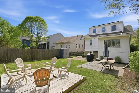 a view of a house with backyard porch and patio