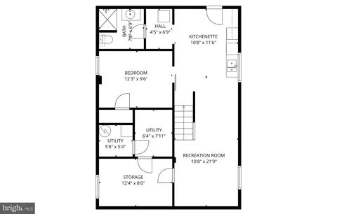 a picture of a bench in front of a wall