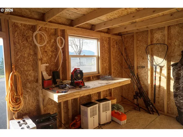 a view of a bathroom with a sink and a mirror