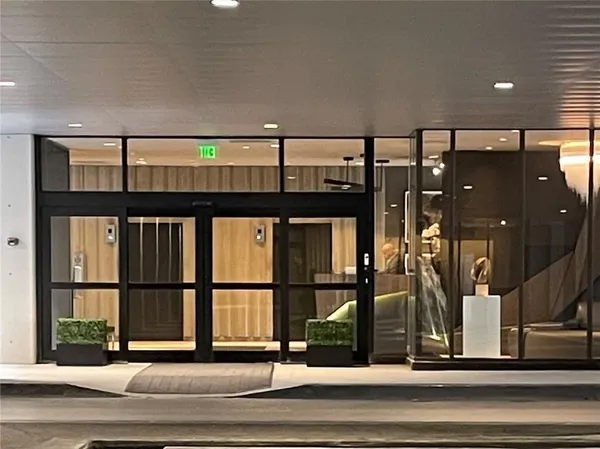 a view of entryway with a front door