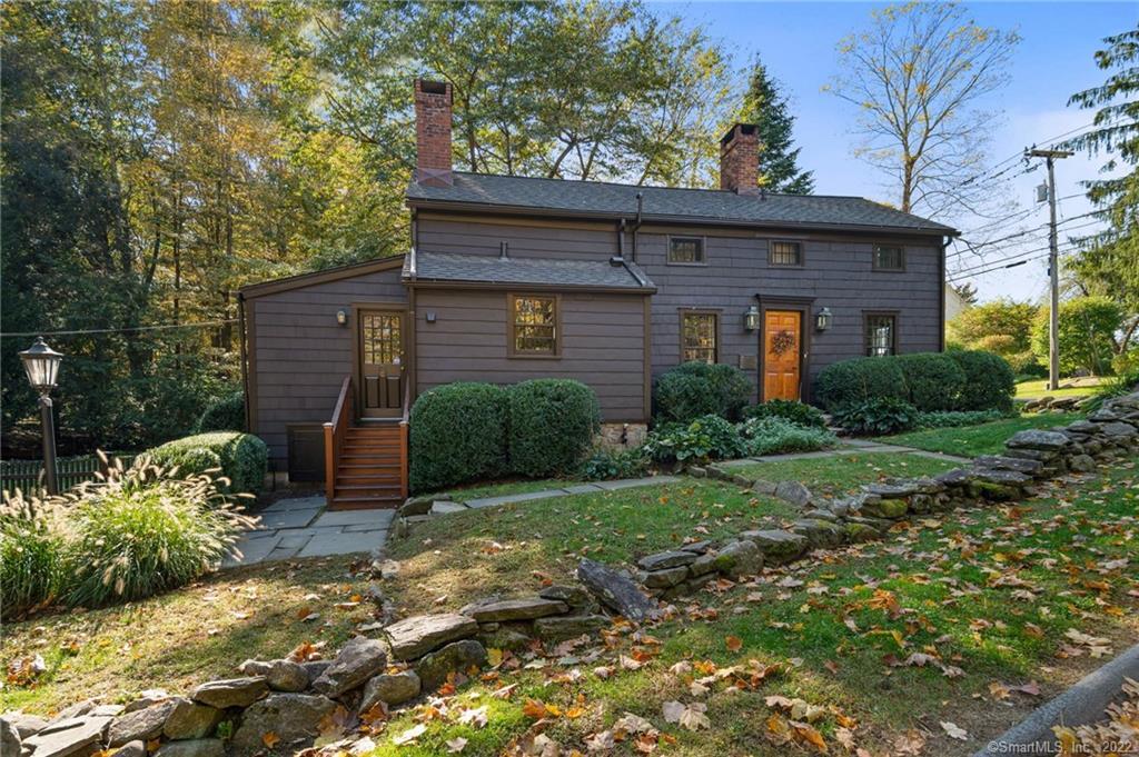 3 Millstone Road Wilton, CT 06897 - Photo 1 of 1 a view of a house with a garden