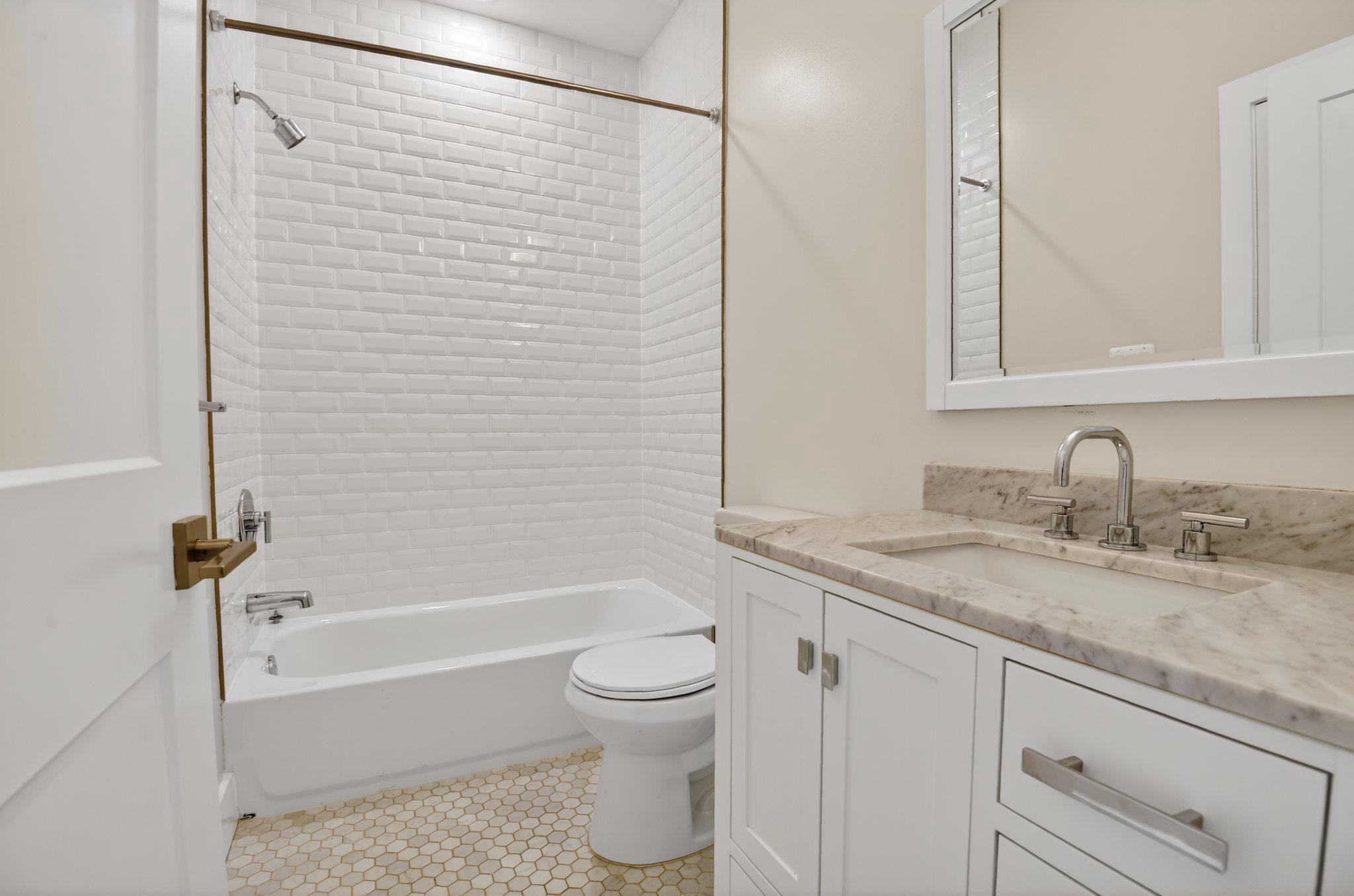 217 20th Street Northeast, Unit 2 Washington, DC 20002 - Photo 14 of 17 Chic second bathroom with modern finishes.