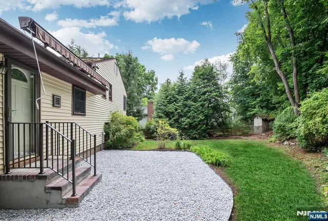 a view of a backyard with a garden