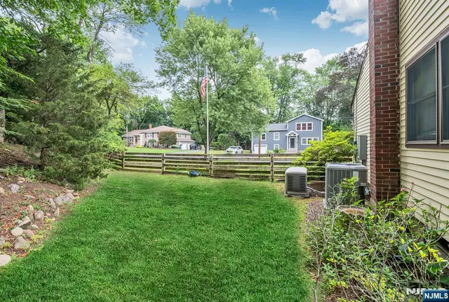 a house view with a sitting space and garden view