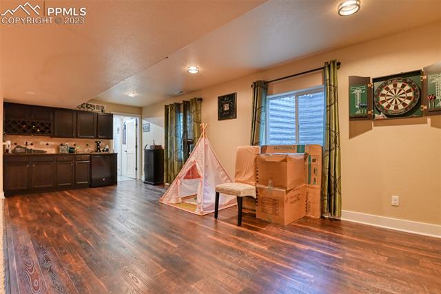 9785 Terrain Road Fountain, CO 80817 - Photo 29 of 40 basement great room w/wetbar