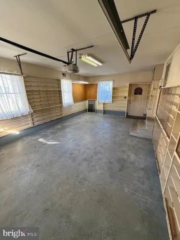 a view of a room with wooden racks