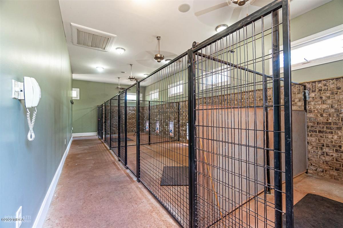 125 Raleigh Drive Forsyth, GA 31029 - Photo 14 of 37 a view of a hallway with wooden floor