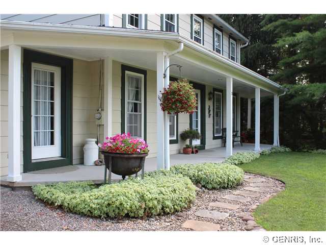 7791 Victor Mendon Road Victor, NY 14564 - Photo 1 of 1 Exterior Front. Gorgeous Colonial with relaxing co