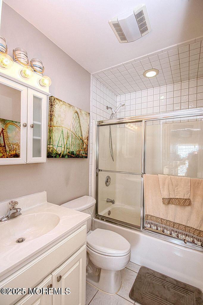 30 Stockton Avenue Seaside Park, NJ 08752 - Photo 15 of 16 a bathroom with a sink a toilet and shower