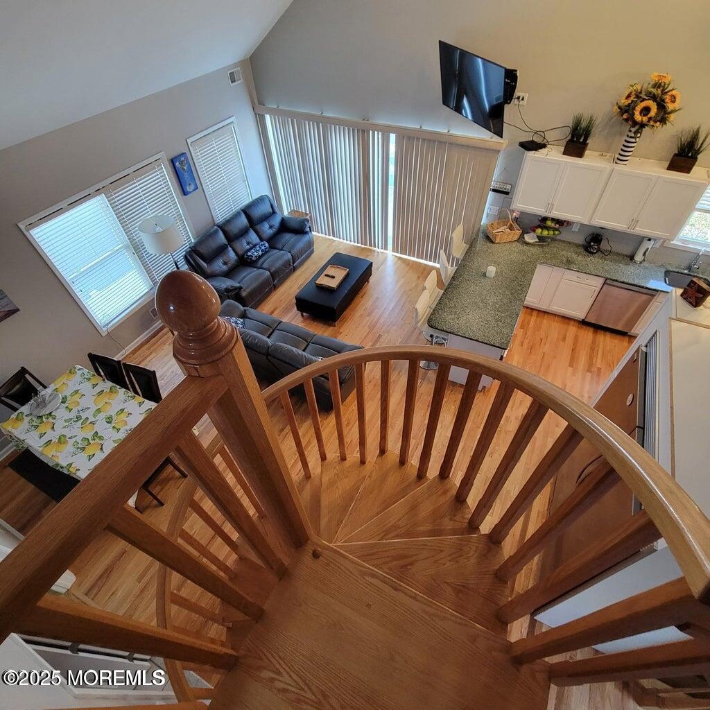 30 Stockton Avenue Seaside Park, NJ 08752 - Photo 6 of 16 a view of a workspace with furniture and a couch