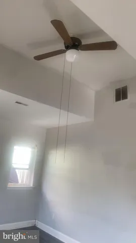 a view of a window in an empty room