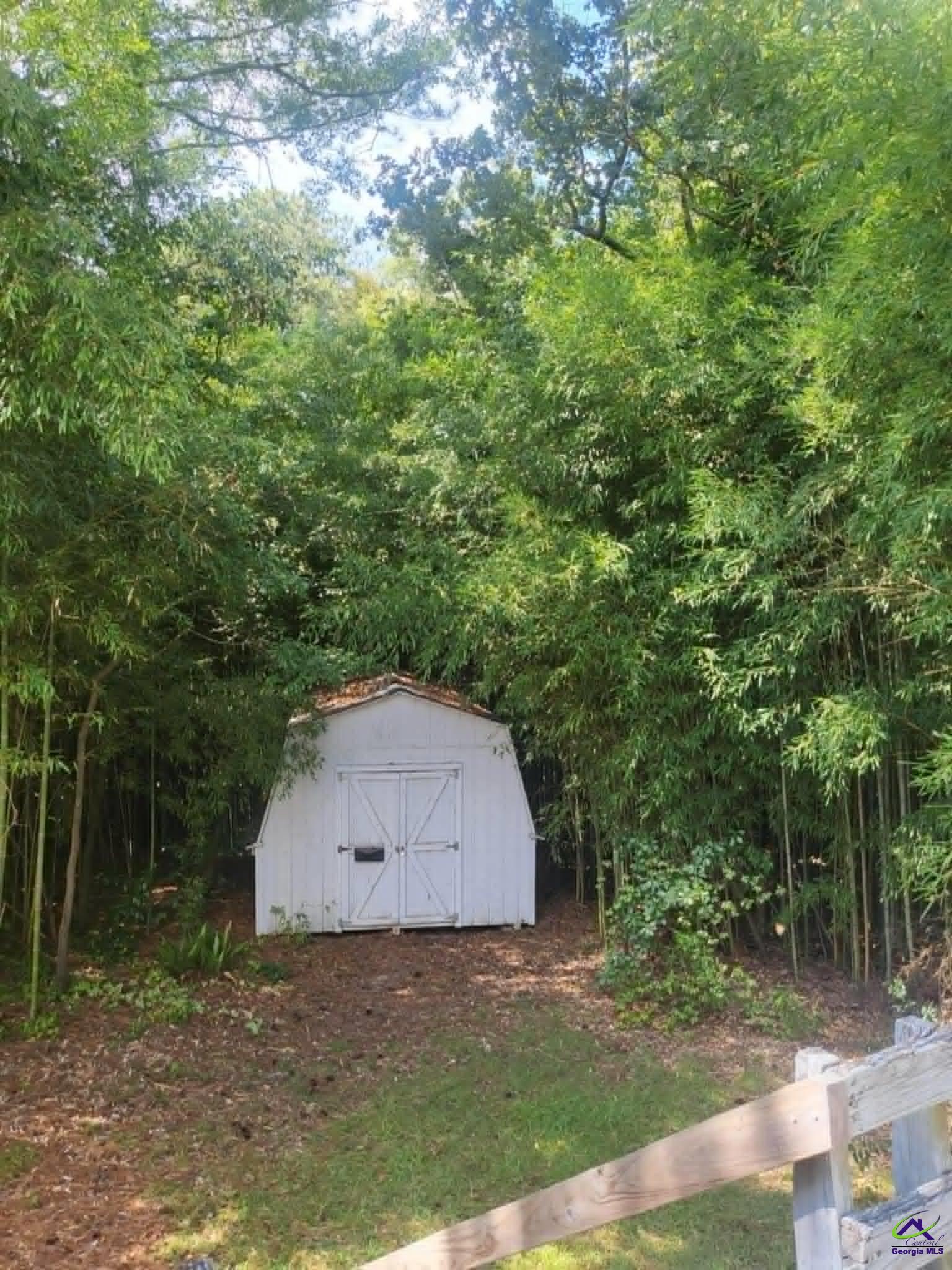 4472 Club Trace Macon, GA 31210 - Photo 2 of 10 a view of house with backyard and trees