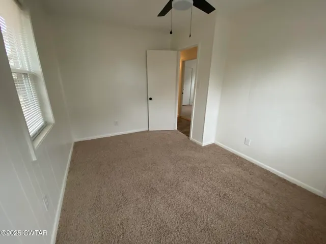 a bathroom with a shower and a bath tub