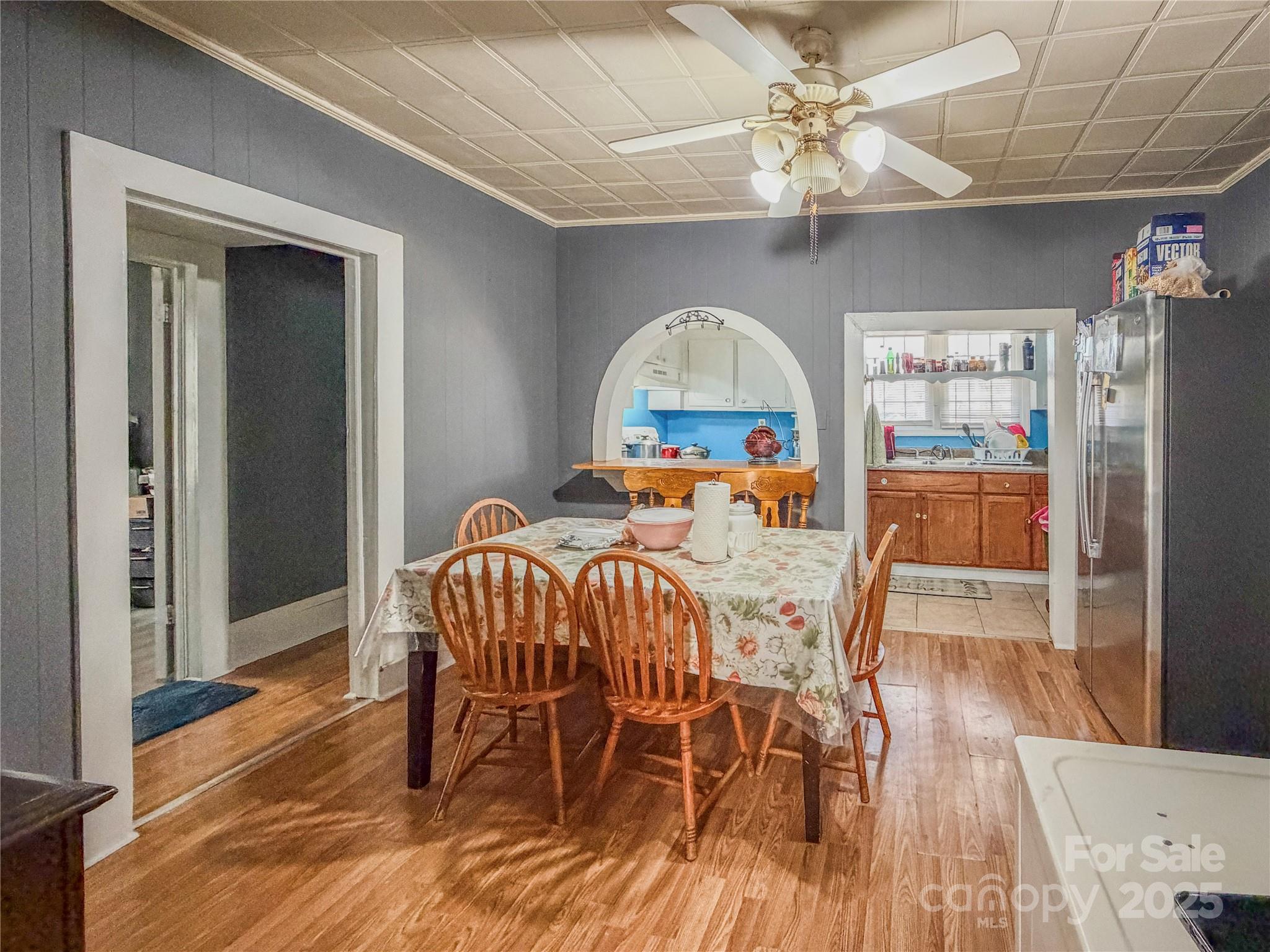 618 Clyde Street Gastonia, NC 28052 - Photo 2 of 8 a view of a dining room with furniture window and wooden floor