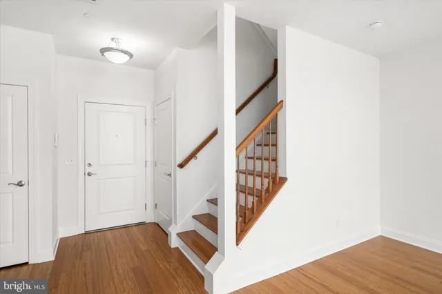 a view of entryway with wooden floor