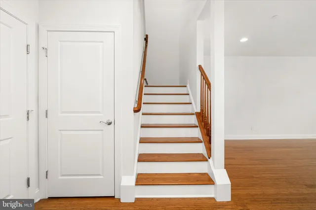 a view of entryway with wooden floor