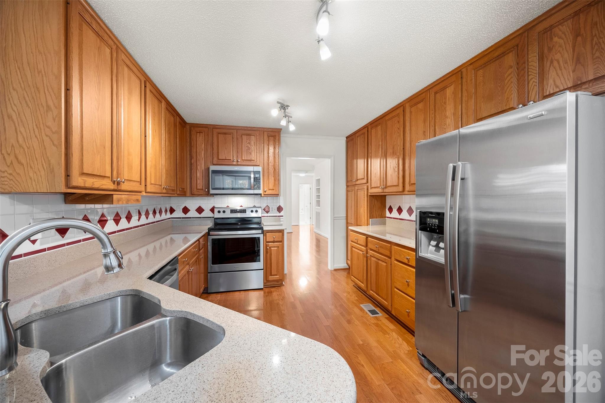 1917 Rucker Road Shelby, NC 28152 - Photo 13 of 41 a kitchen with a refrigerator sink and stove
