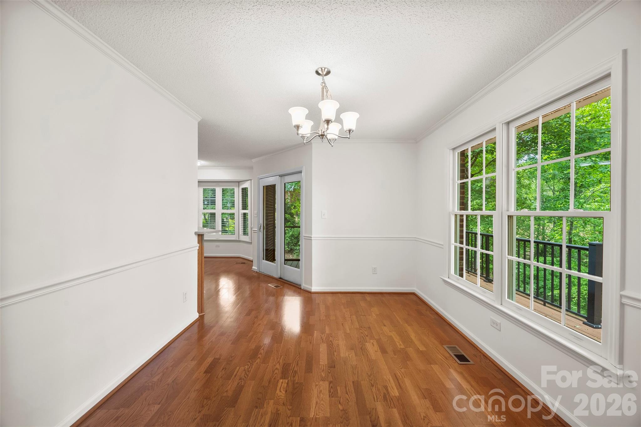 1917 Rucker Road Shelby, NC 28152 - Photo 17 of 41 a view of a room with wooden floor and large windows