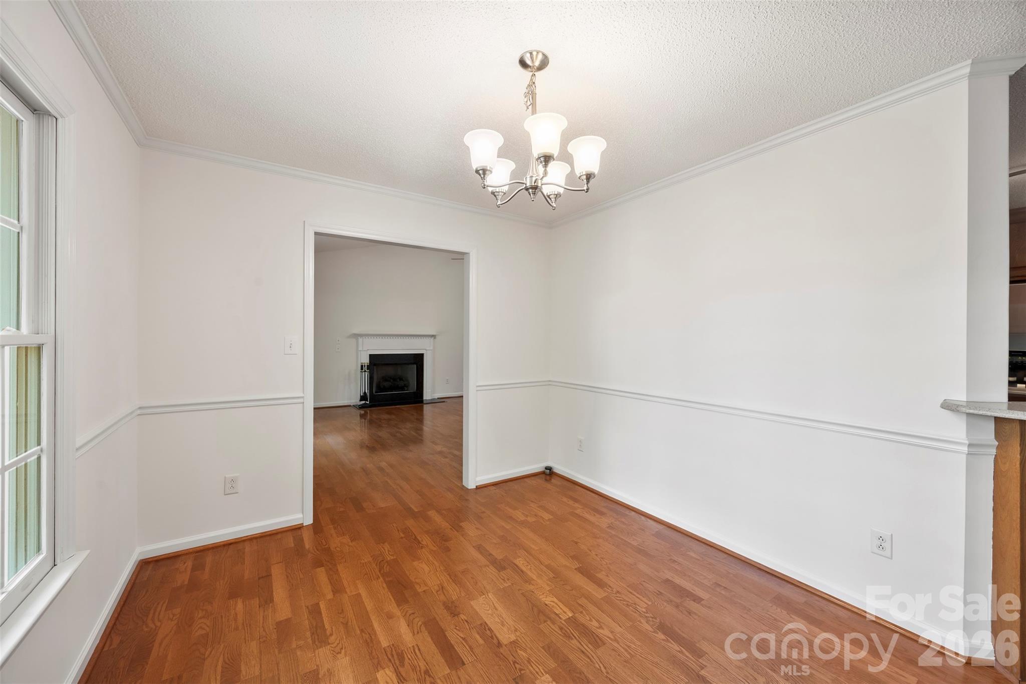 1917 Rucker Road Shelby, NC 28152 - Photo 18 of 41 a view of a room with wooden floor and ceiling fan