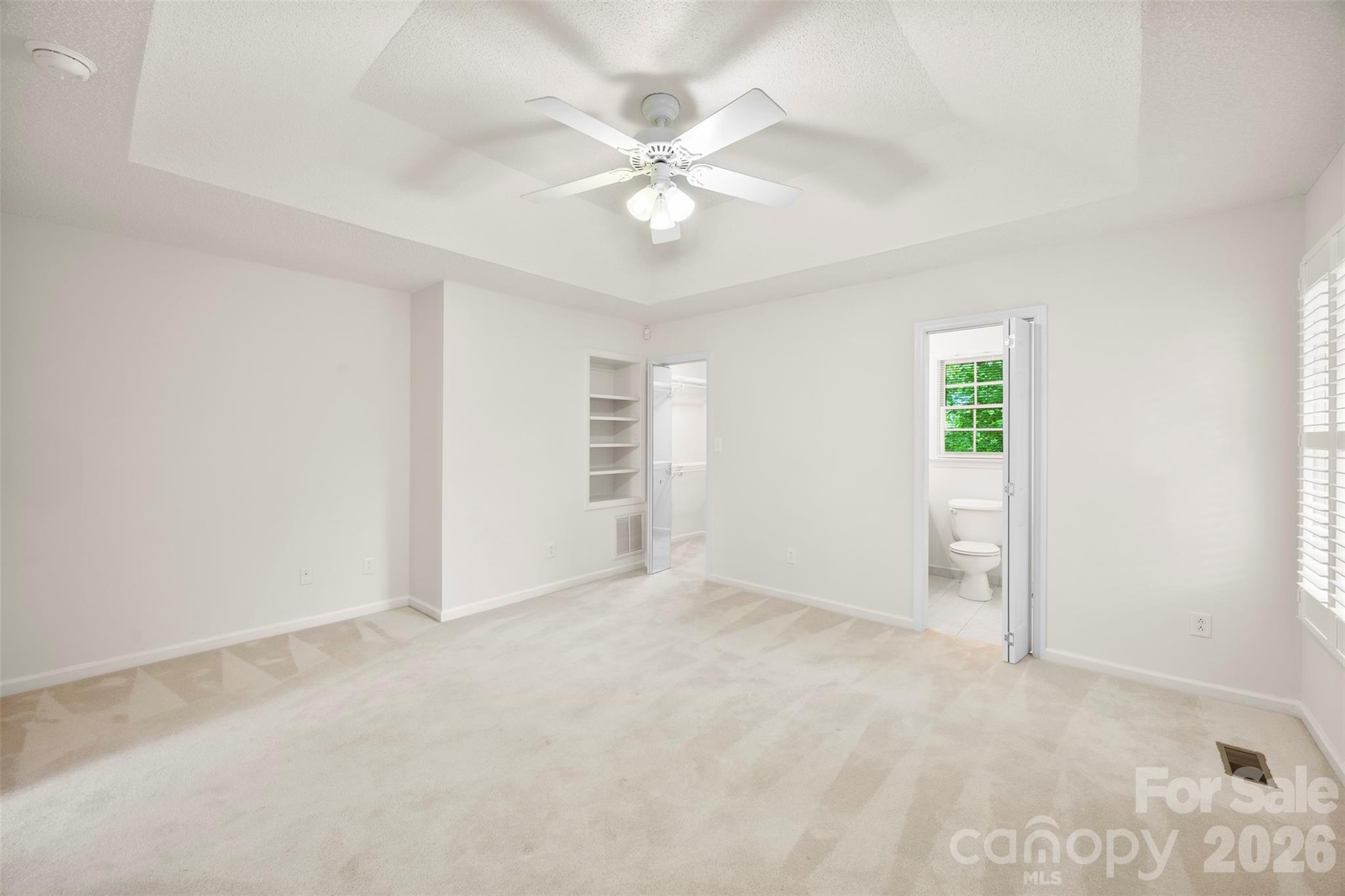 1917 Rucker Road Shelby, NC 28152 - Photo 22 of 41 an empty room with closet and a ceiling fan