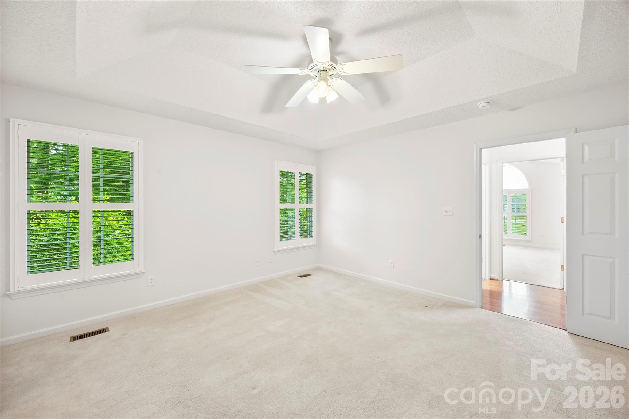 1917 Rucker Road Shelby, NC 28152 - Photo 23 of 41 an empty room with windows and fan